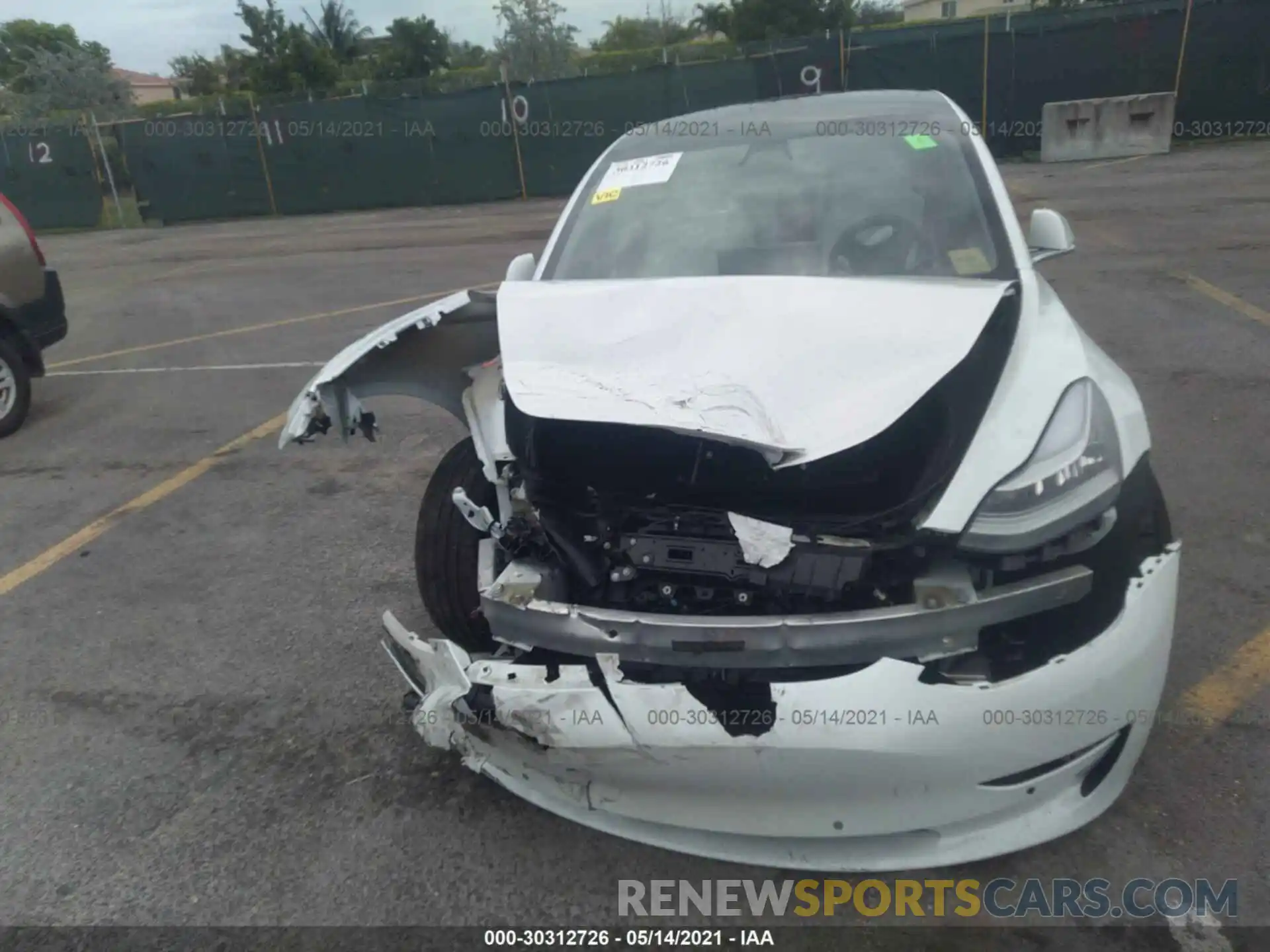 6 Photograph of a damaged car 5YJ3E1EB7LF720156 TESLA MODEL 3 2020