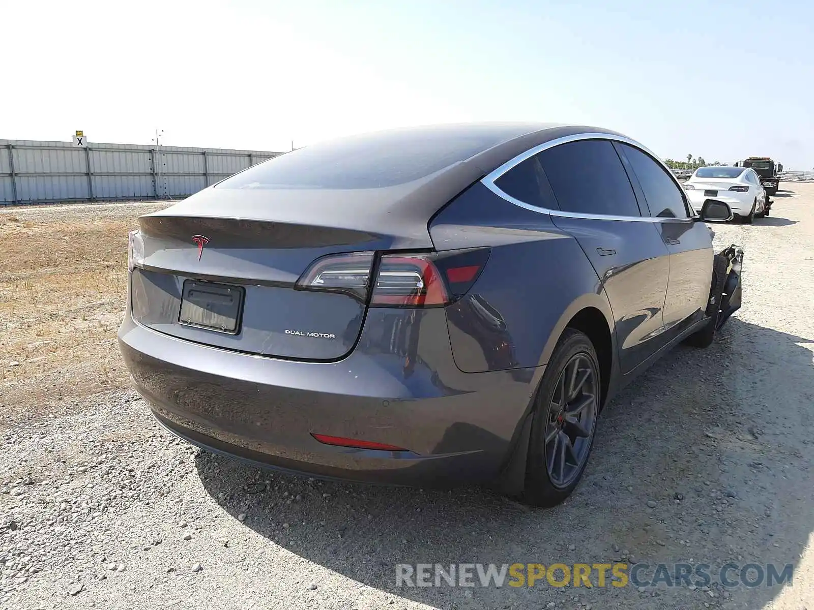 4 Photograph of a damaged car 5YJ3E1EB7LF741461 TESLA MODEL 3 2020