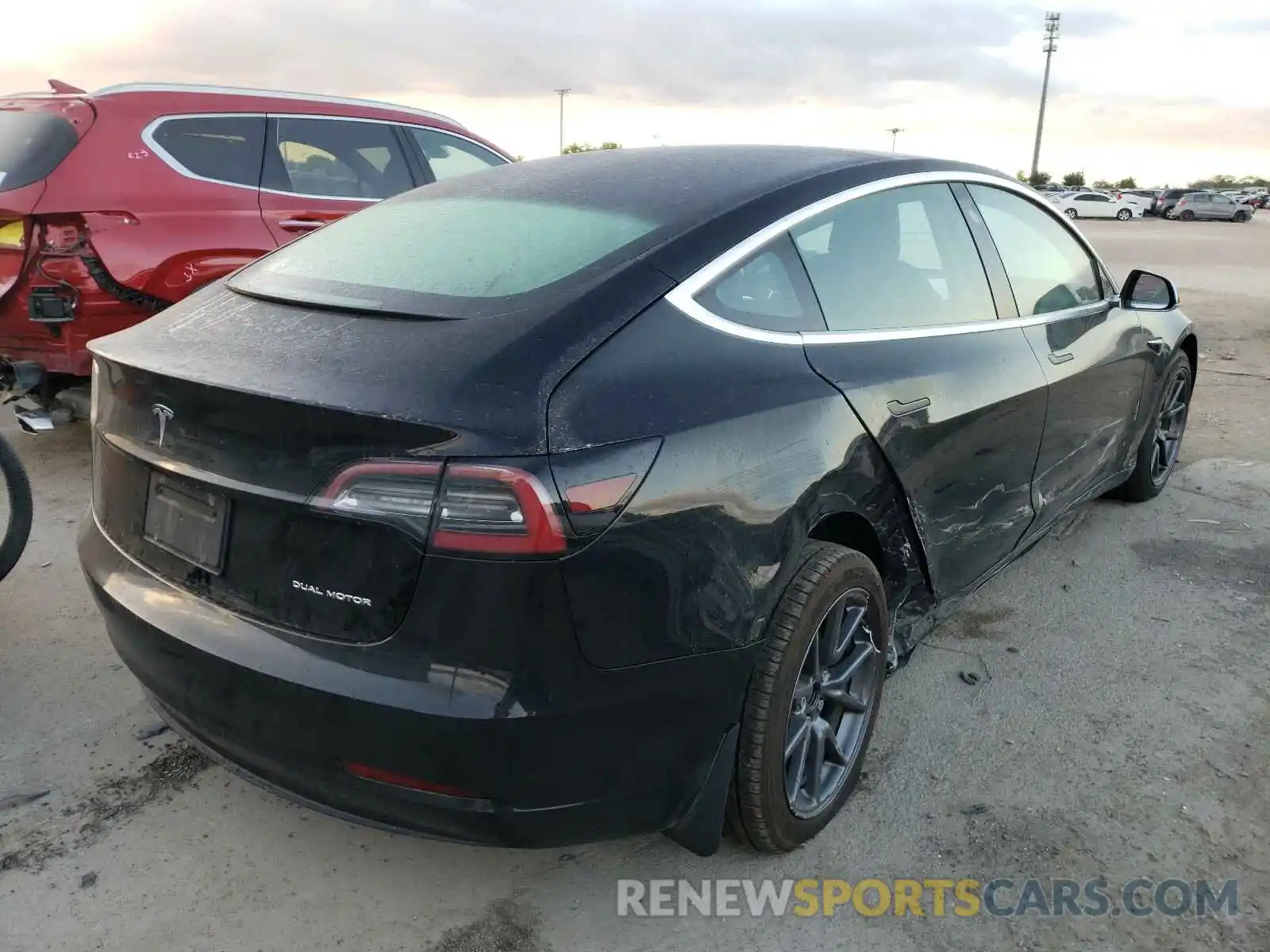 4 Photograph of a damaged car 5YJ3E1EB7LF770359 TESLA MODEL 3 2020