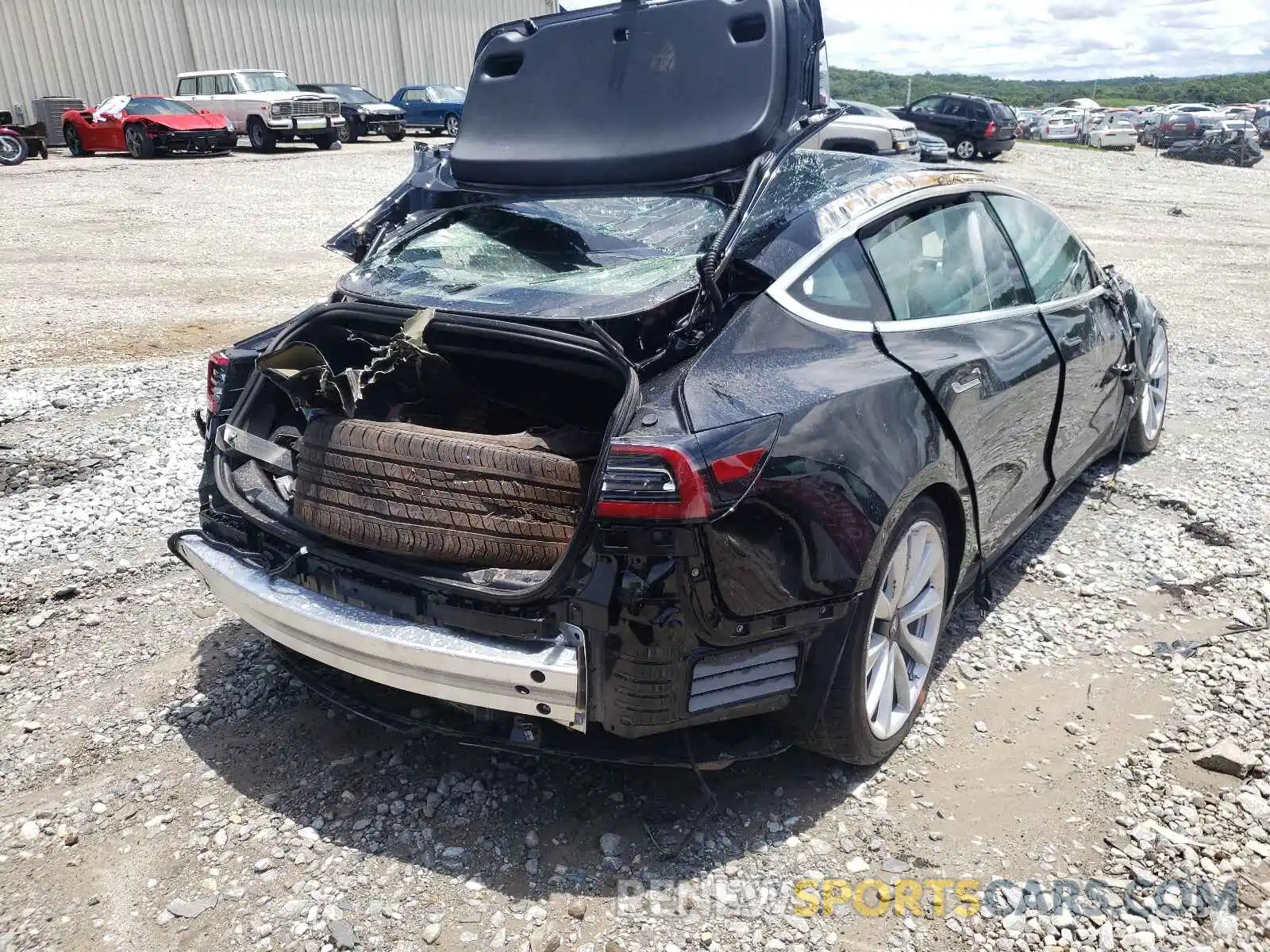 4 Photograph of a damaged car 5YJ3E1EB7LF795942 TESLA MODEL 3 2020