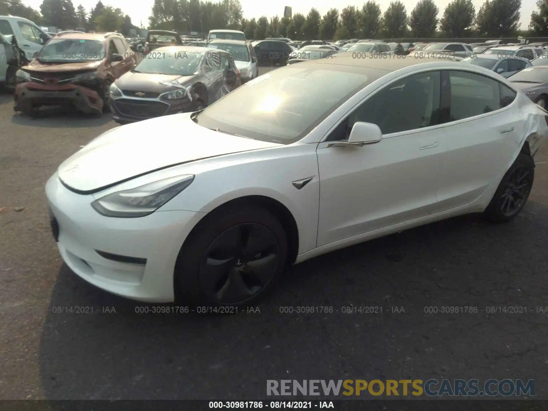 2 Photograph of a damaged car 5YJ3E1EB7LF801061 TESLA MODEL 3 2020