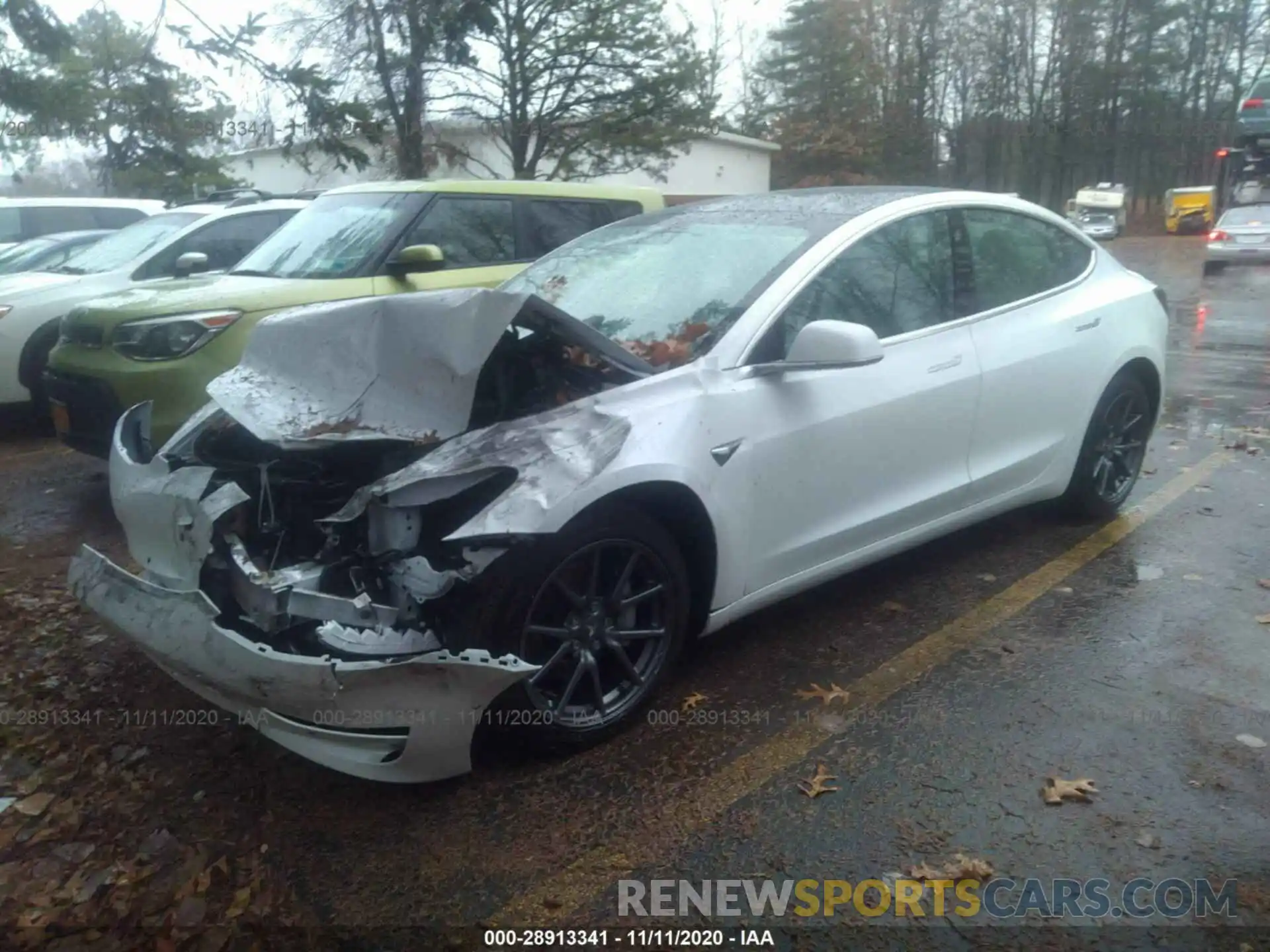 2 Photograph of a damaged car 5YJ3E1EB8LF606912 TESLA MODEL 3 2020