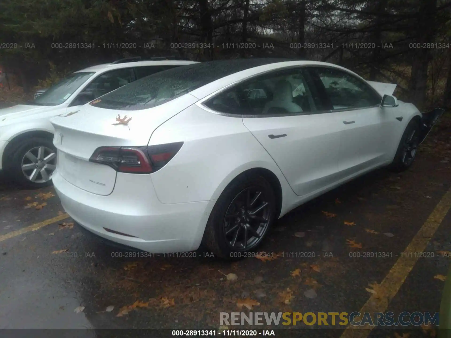 4 Photograph of a damaged car 5YJ3E1EB8LF606912 TESLA MODEL 3 2020