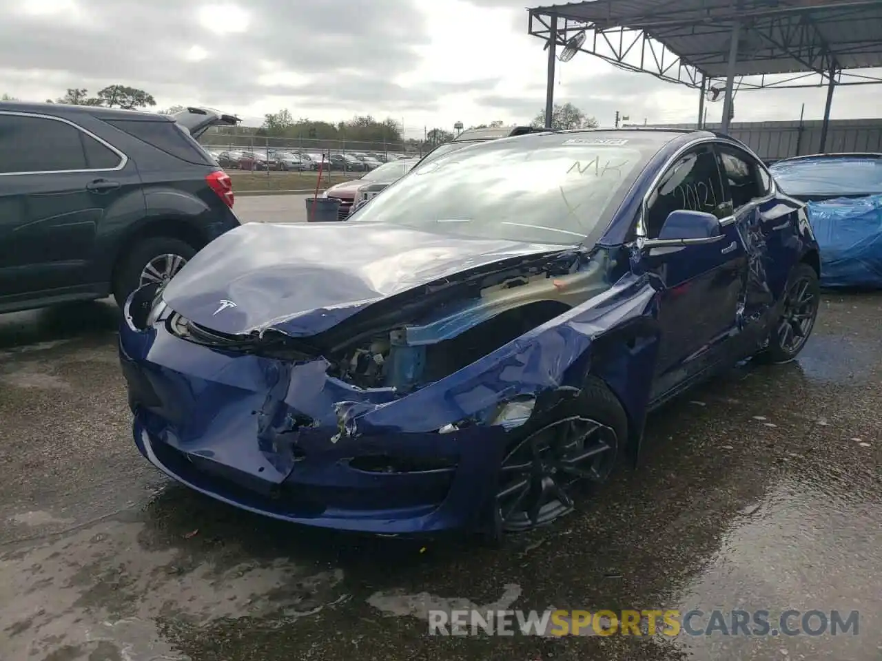 2 Photograph of a damaged car 5YJ3E1EB8LF617571 TESLA MODEL 3 2020