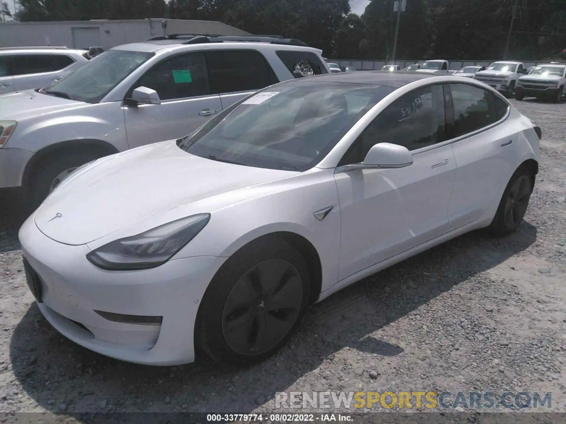 2 Photograph of a damaged car 5YJ3E1EB8LF617974 TESLA MODEL 3 2020