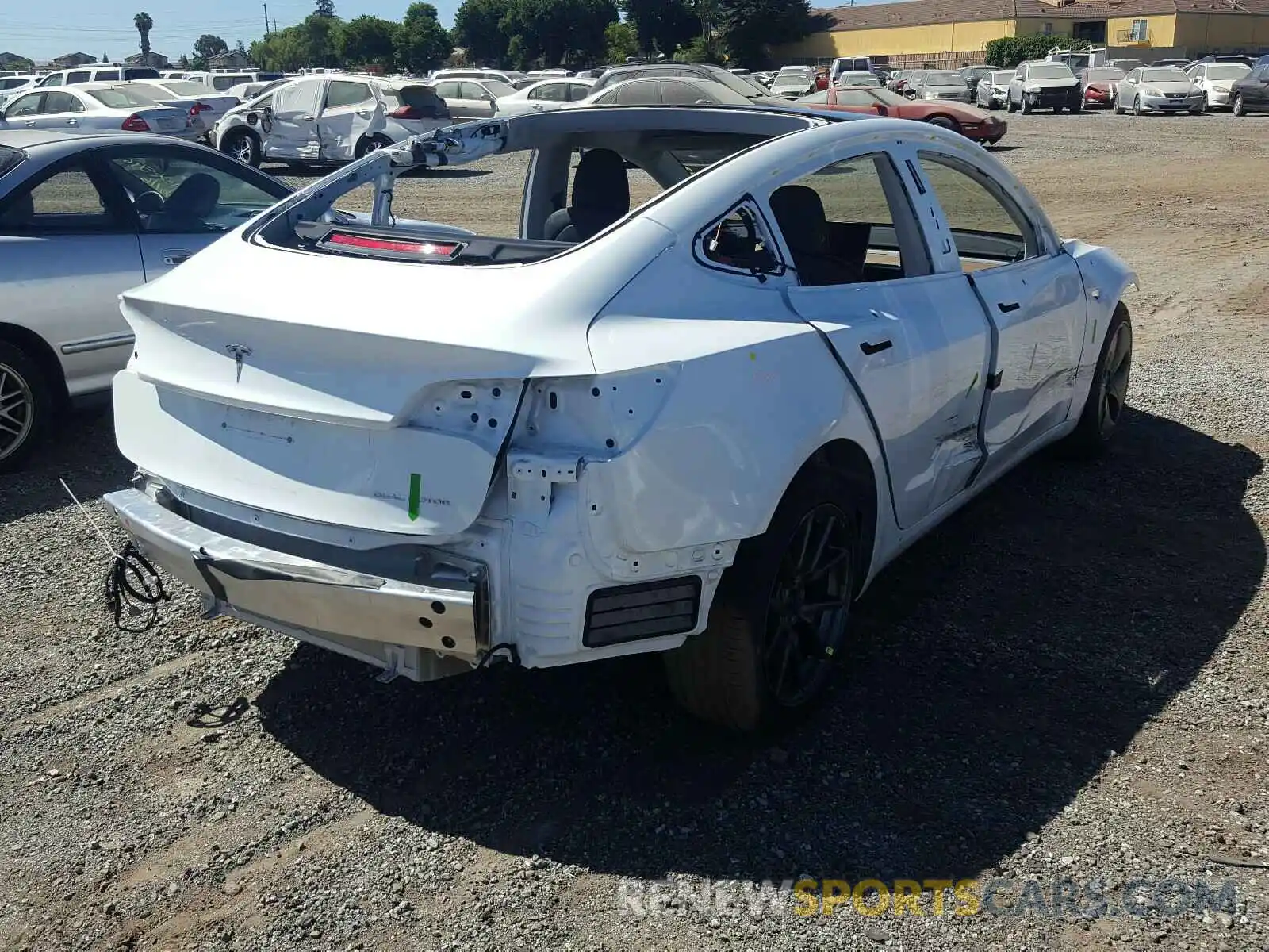 4 Photograph of a damaged car 5YJ3E1EB8LF618879 TESLA MODEL 3 2020