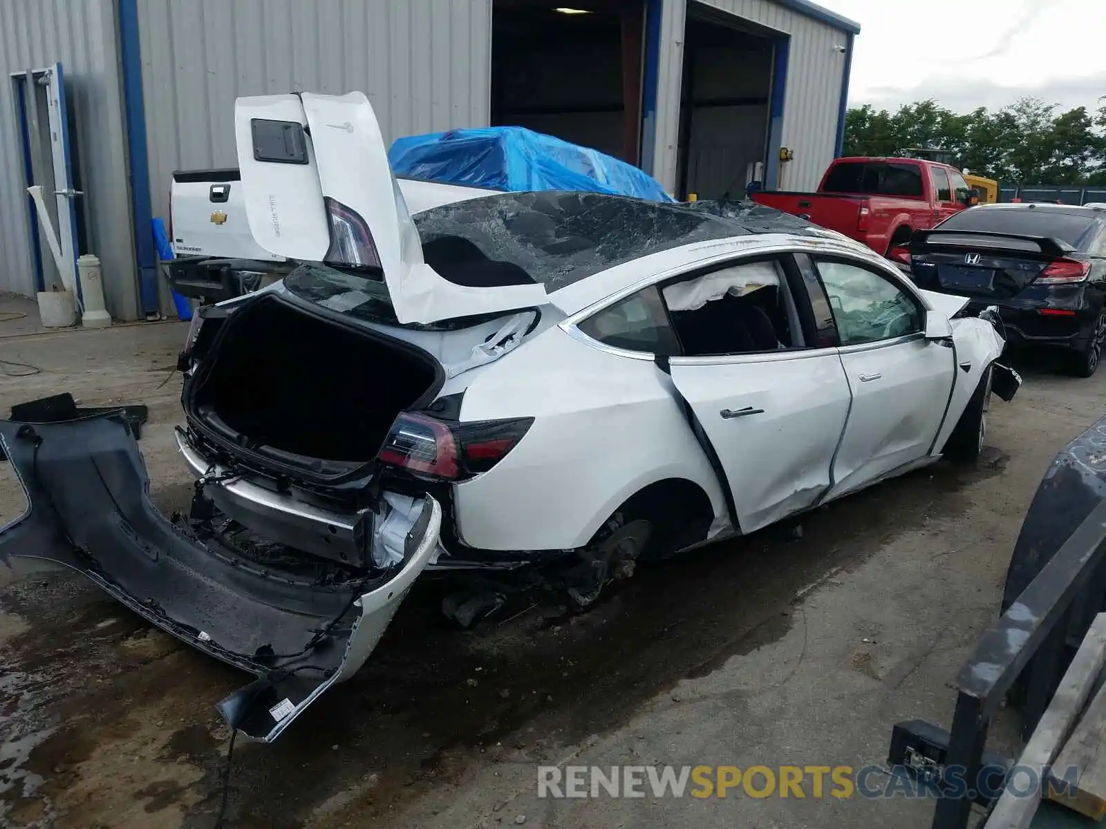 4 Photograph of a damaged car 5YJ3E1EB8LF621040 TESLA MODEL 3 2020