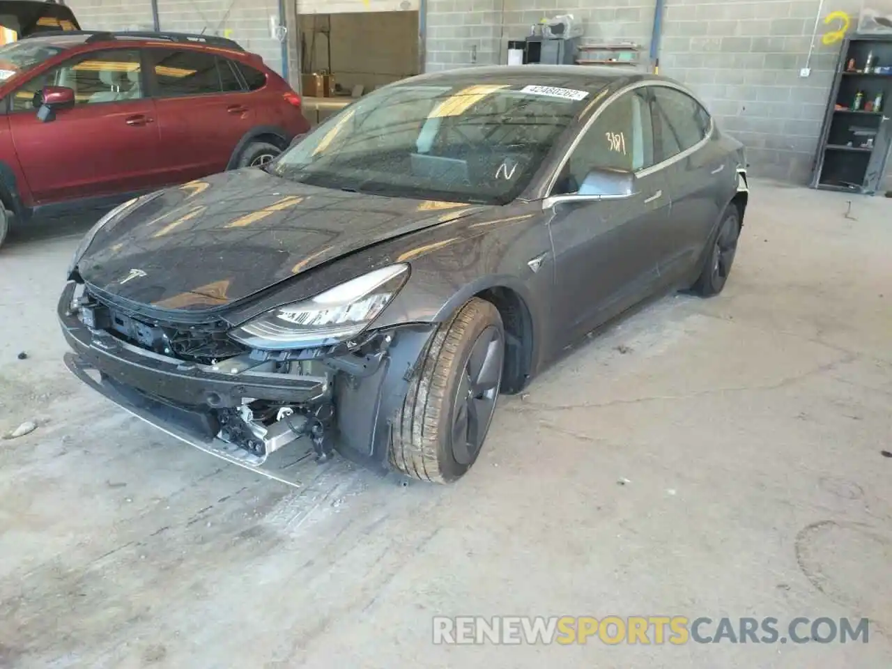 2 Photograph of a damaged car 5YJ3E1EB8LF635696 TESLA MODEL 3 2020