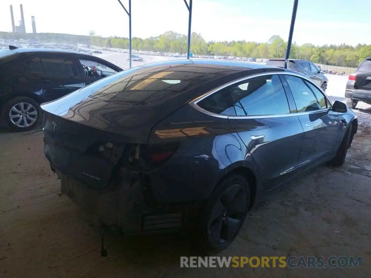 4 Photograph of a damaged car 5YJ3E1EB8LF635696 TESLA MODEL 3 2020