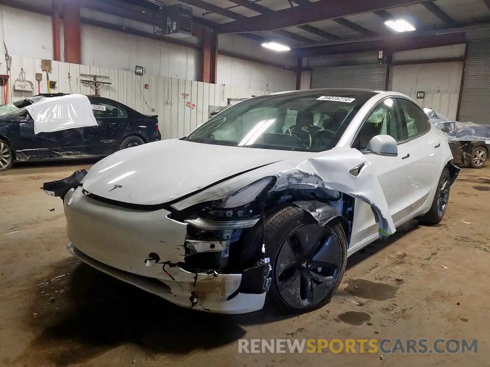 2 Photograph of a damaged car 5YJ3E1EB8LF636685 TESLA MODEL 3 2020