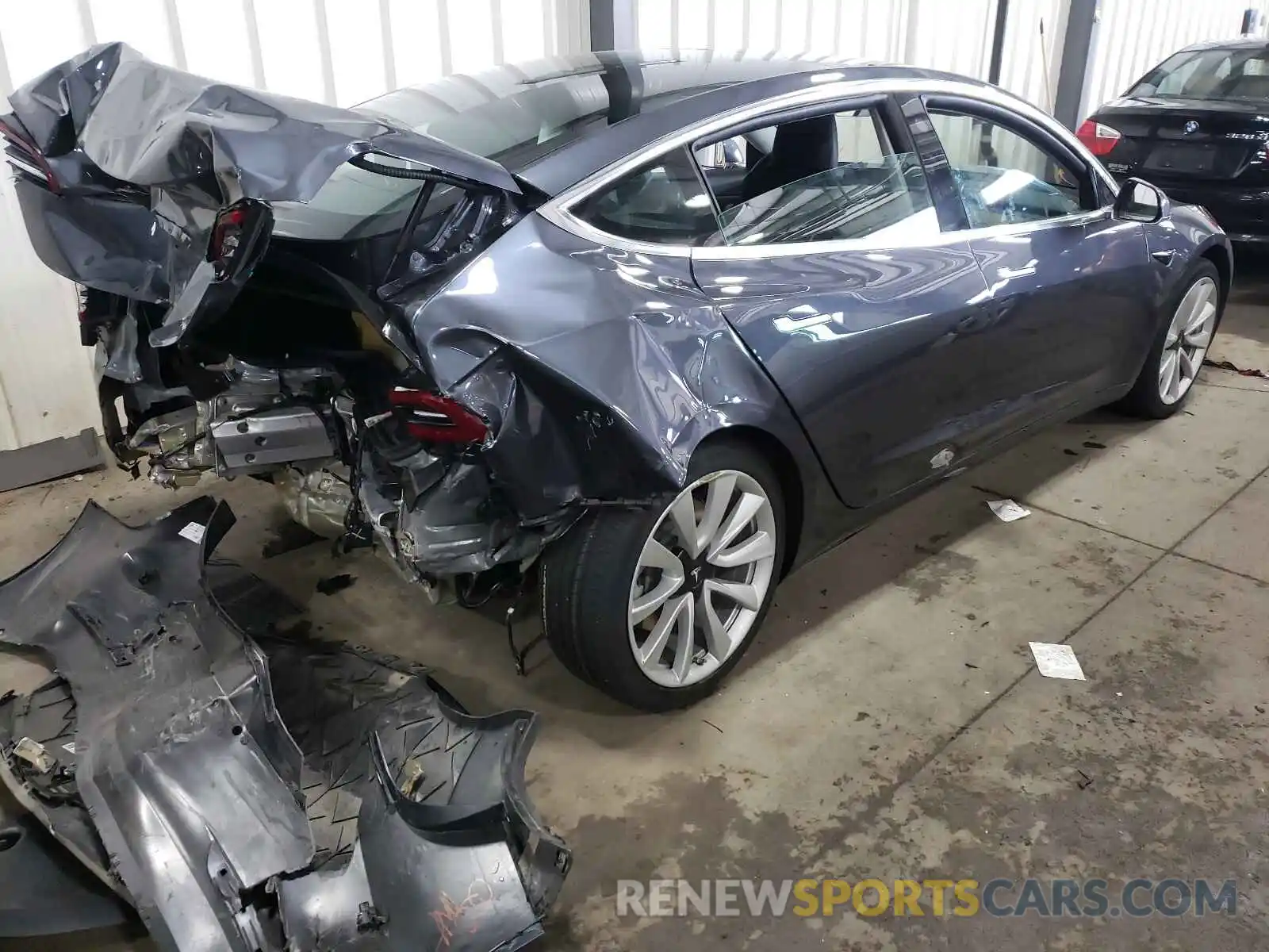 4 Photograph of a damaged car 5YJ3E1EB8LF666432 TESLA MODEL 3 2020