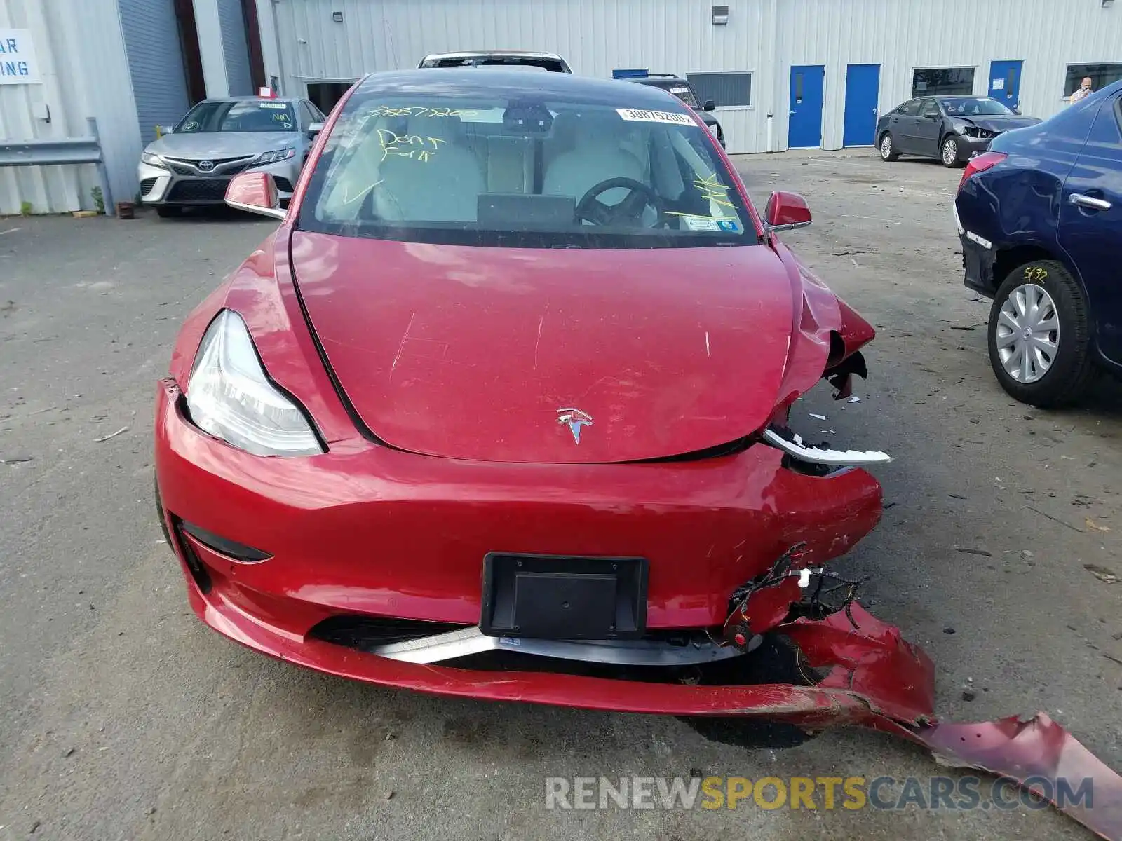 9 Photograph of a damaged car 5YJ3E1EB8LF719971 TESLA MODEL 3 2020