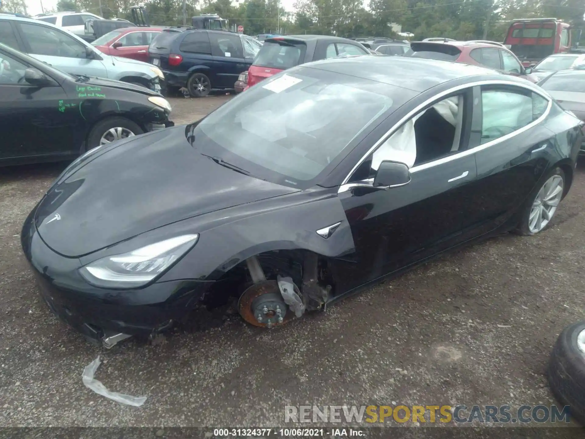 2 Photograph of a damaged car 5YJ3E1EB8LF734809 TESLA MODEL 3 2020