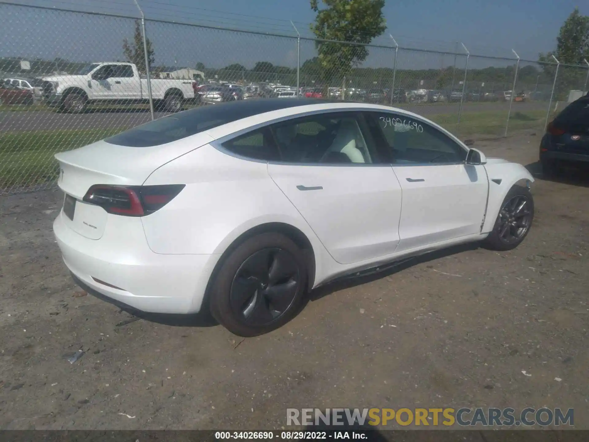 4 Photograph of a damaged car 5YJ3E1EB8LF744711 TESLA MODEL 3 2020