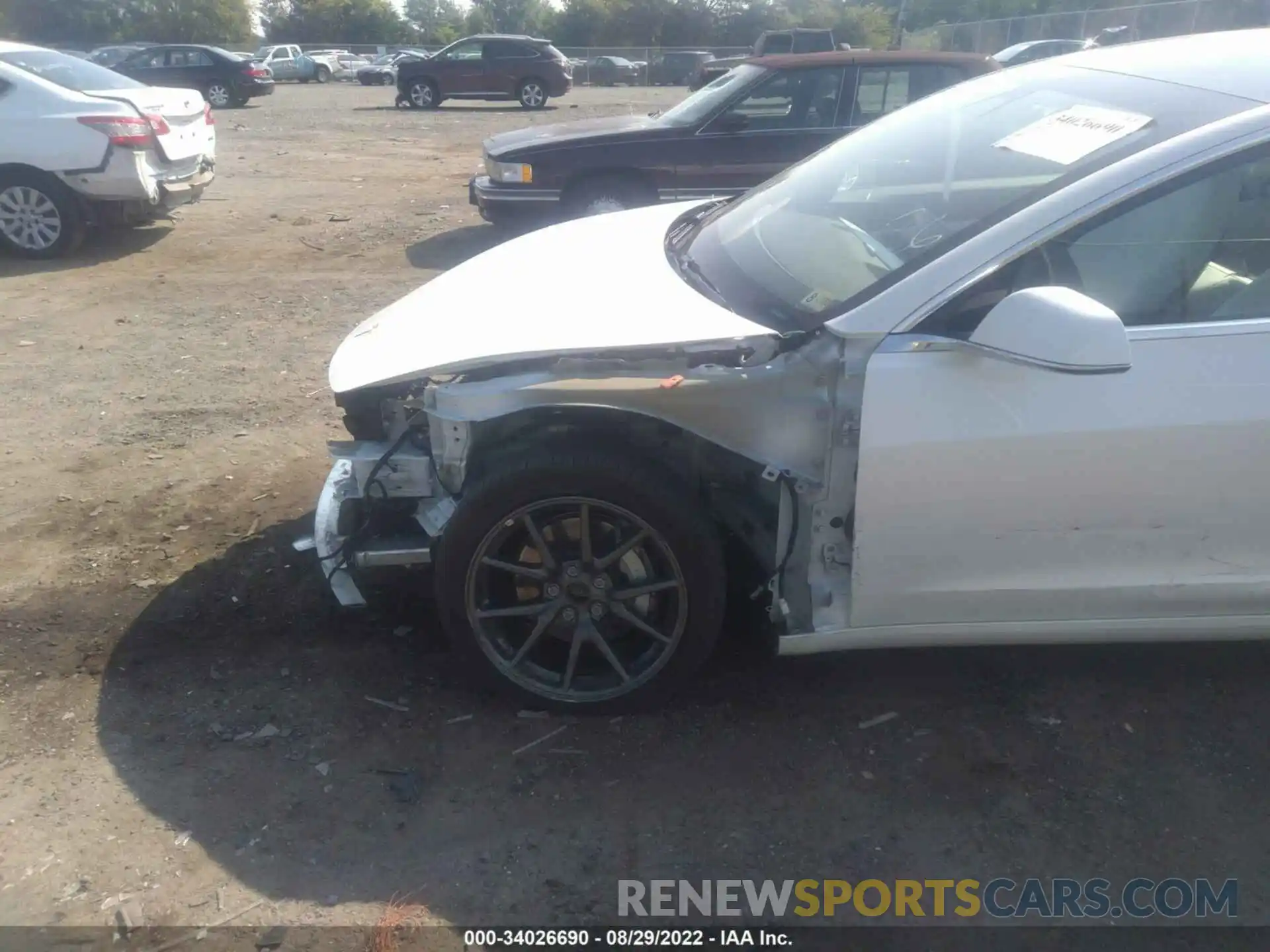 6 Photograph of a damaged car 5YJ3E1EB8LF744711 TESLA MODEL 3 2020