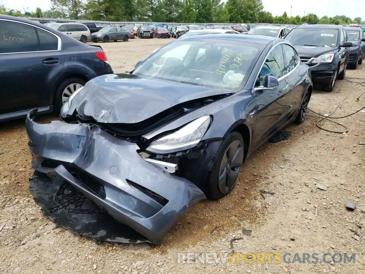 2 Photograph of a damaged car 5YJ3E1EB8LF793584 TESLA MODEL 3 2020