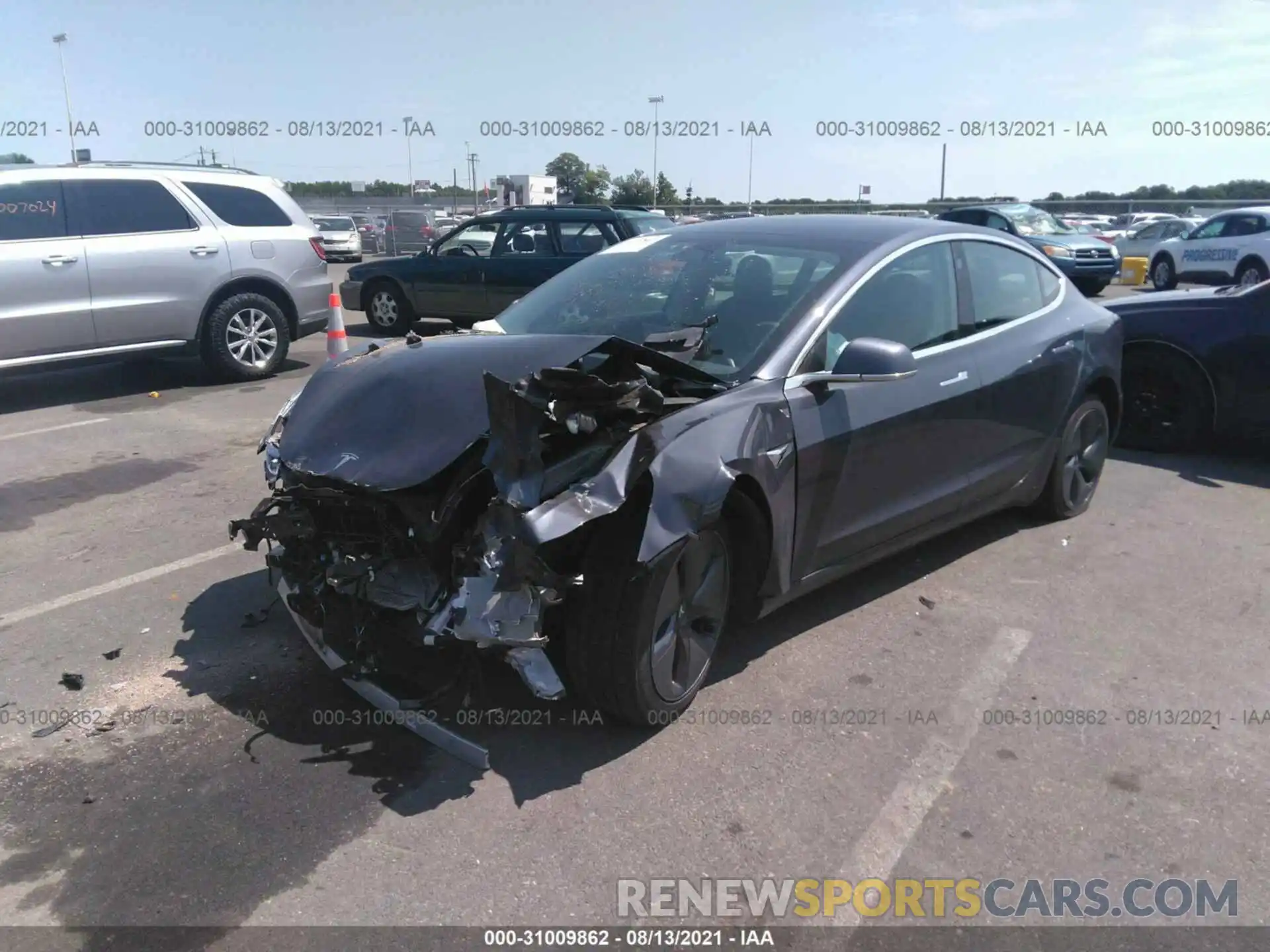 2 Photograph of a damaged car 5YJ3E1EB8LF794718 TESLA MODEL 3 2020