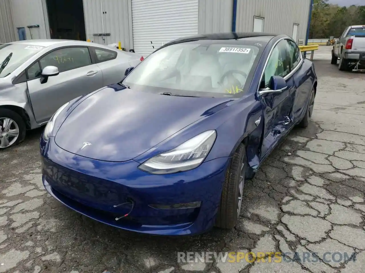 2 Photograph of a damaged car 5YJ3E1EB8LF801635 TESLA MODEL 3 2020