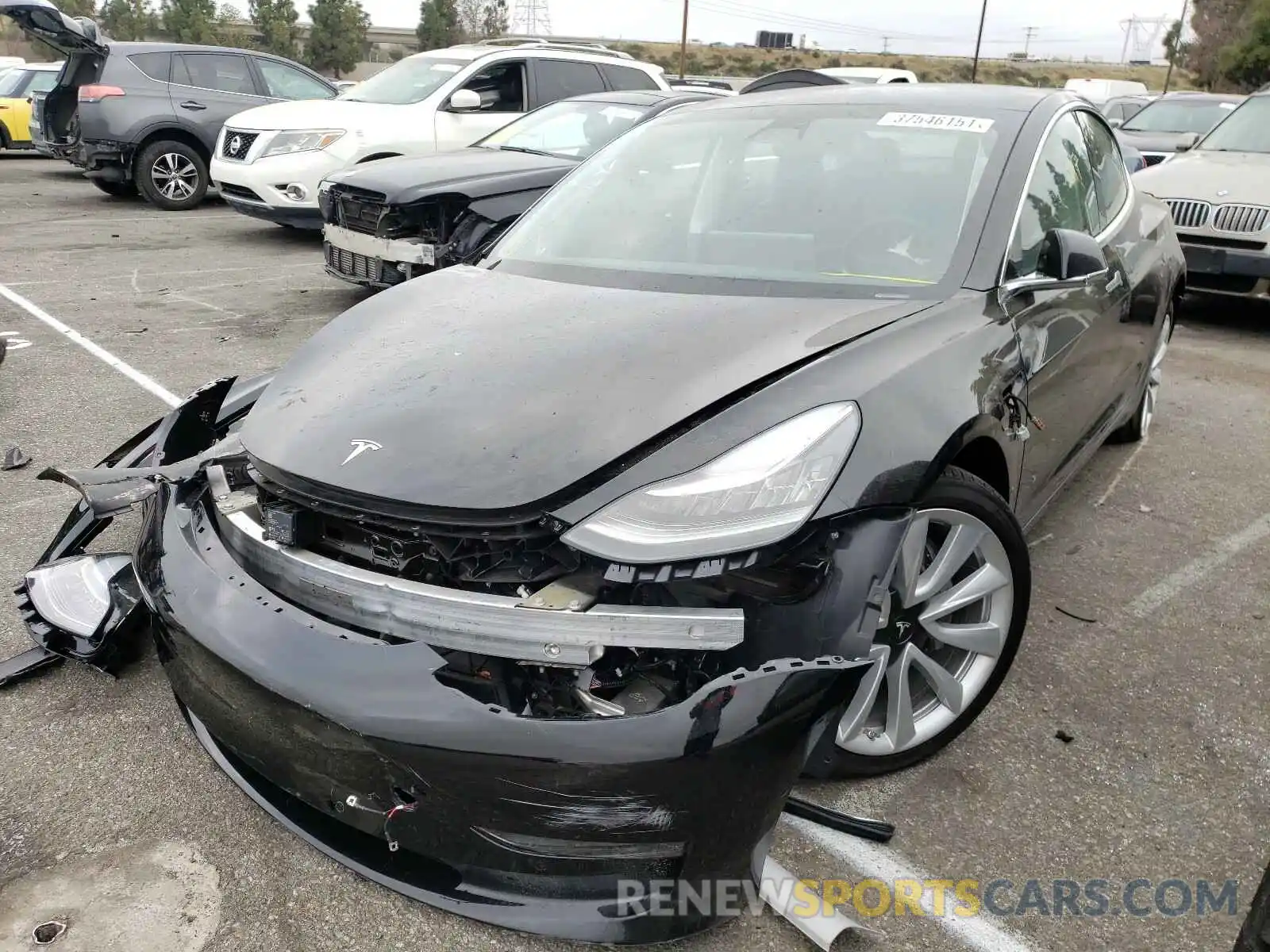 2 Photograph of a damaged car 5YJ3E1EB8LF806995 TESLA MODEL 3 2020