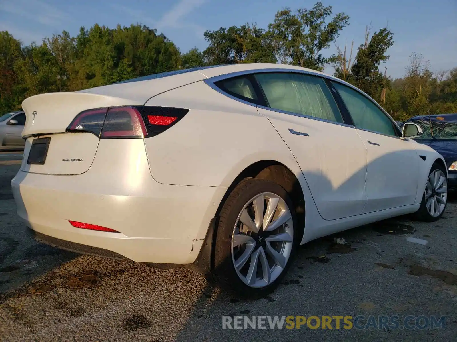 4 Photograph of a damaged car 5YJ3E1EB9LF589070 TESLA MODEL 3 2020