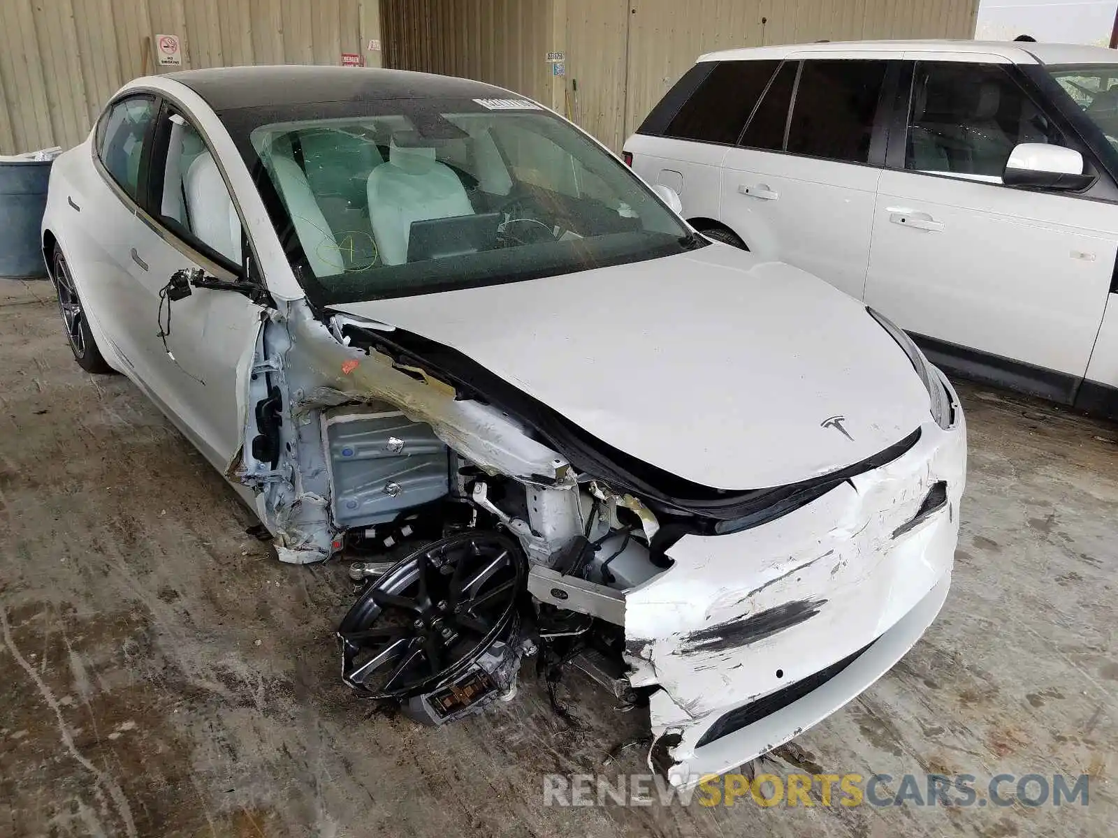 1 Photograph of a damaged car 5YJ3E1EB9LF607048 TESLA MODEL 3 2020