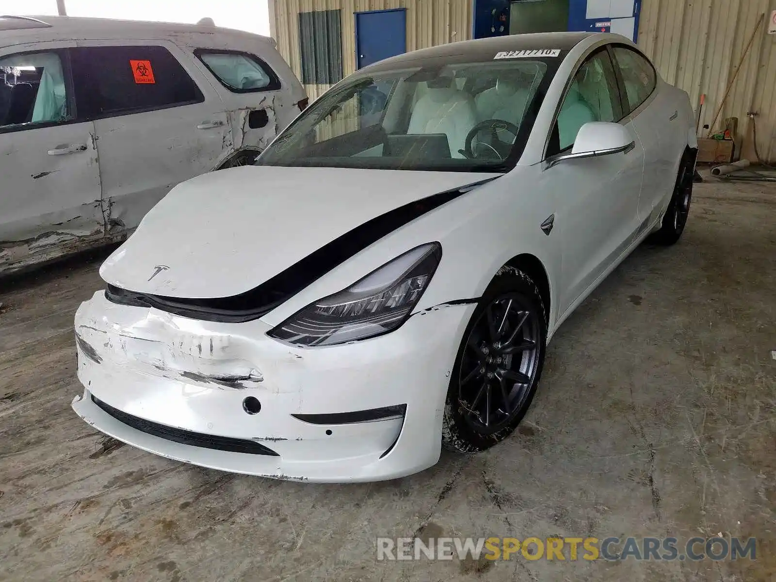 2 Photograph of a damaged car 5YJ3E1EB9LF607048 TESLA MODEL 3 2020