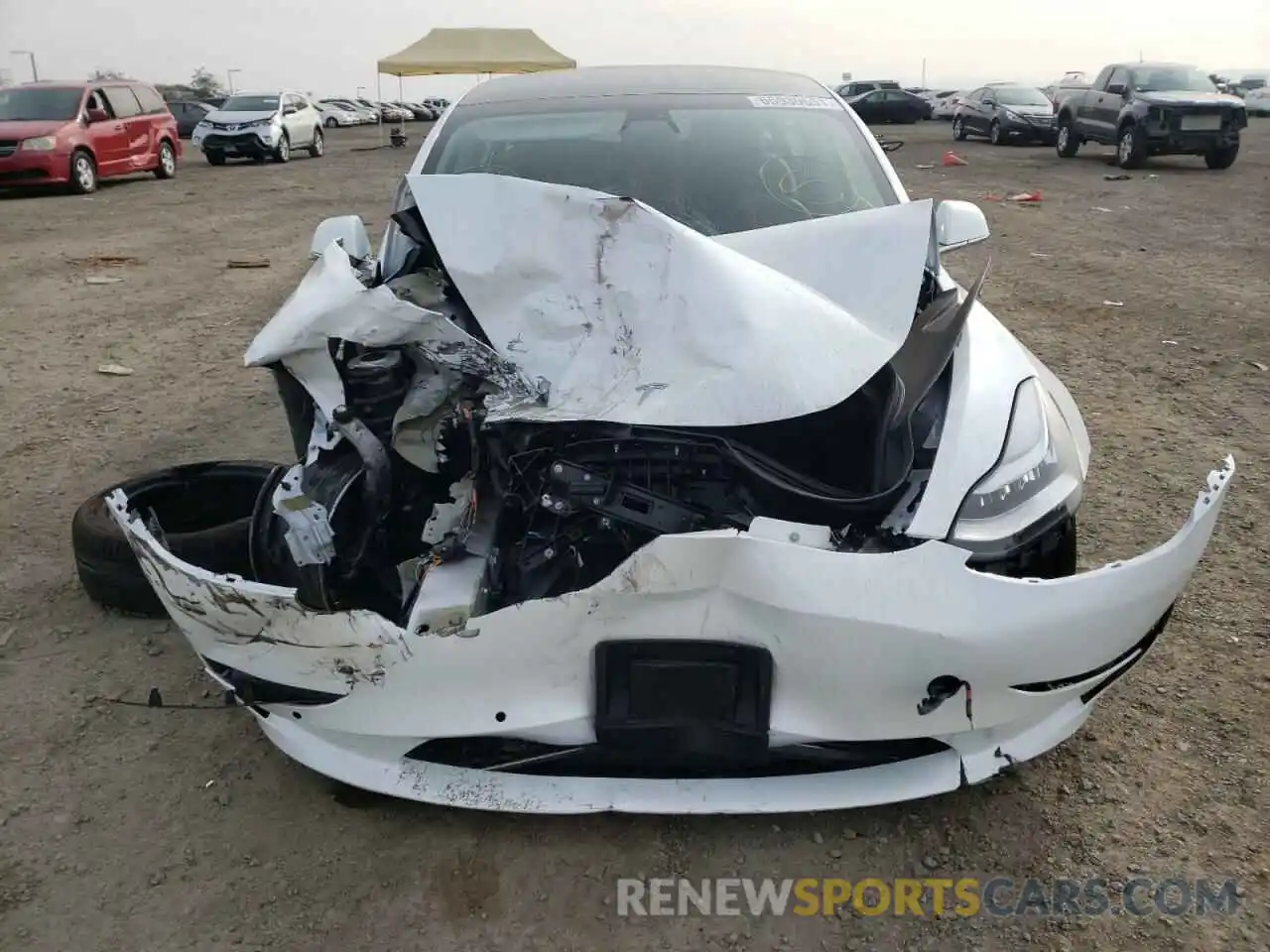 7 Photograph of a damaged car 5YJ3E1EB9LF619698 TESLA MODEL 3 2020