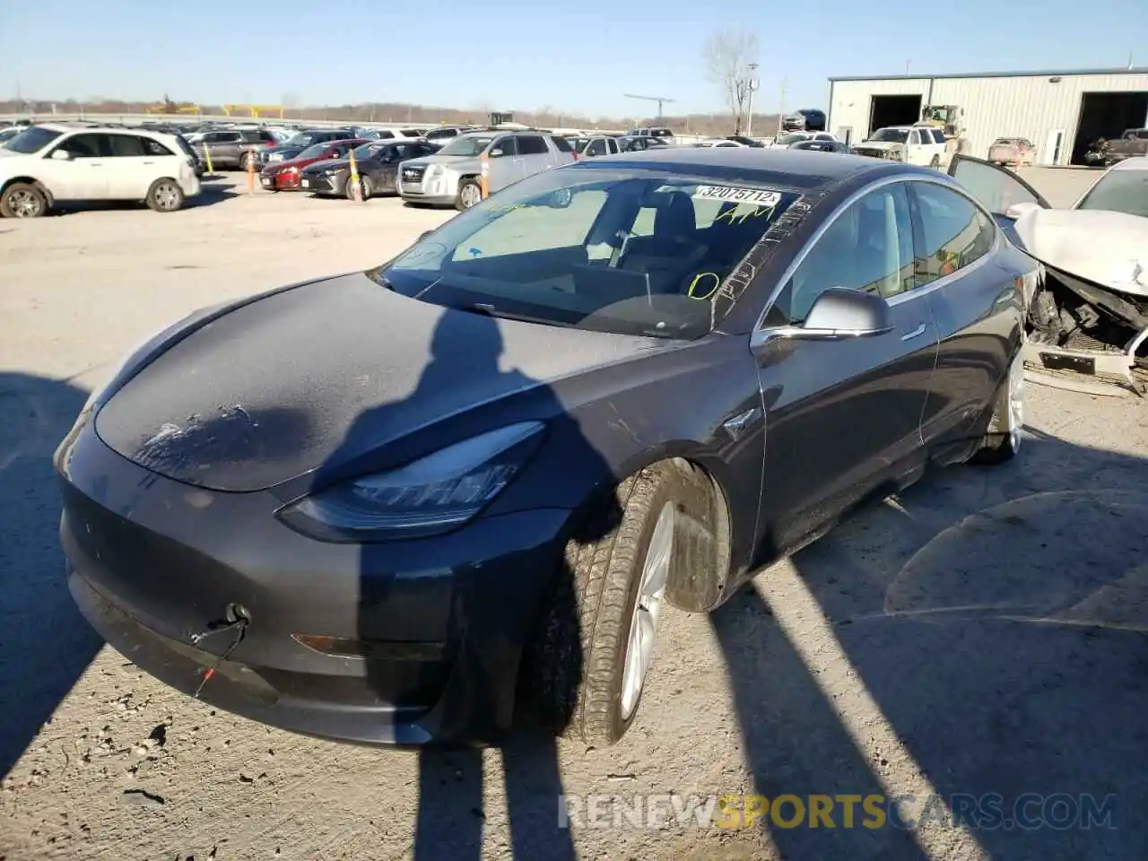 2 Photograph of a damaged car 5YJ3E1EB9LF619975 TESLA MODEL 3 2020