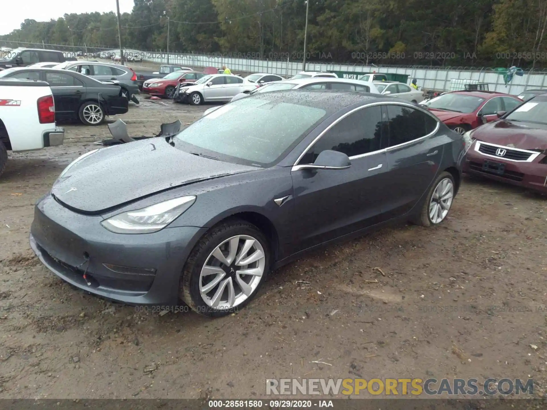 2 Photograph of a damaged car 5YJ3E1EB9LF620169 TESLA MODEL 3 2020