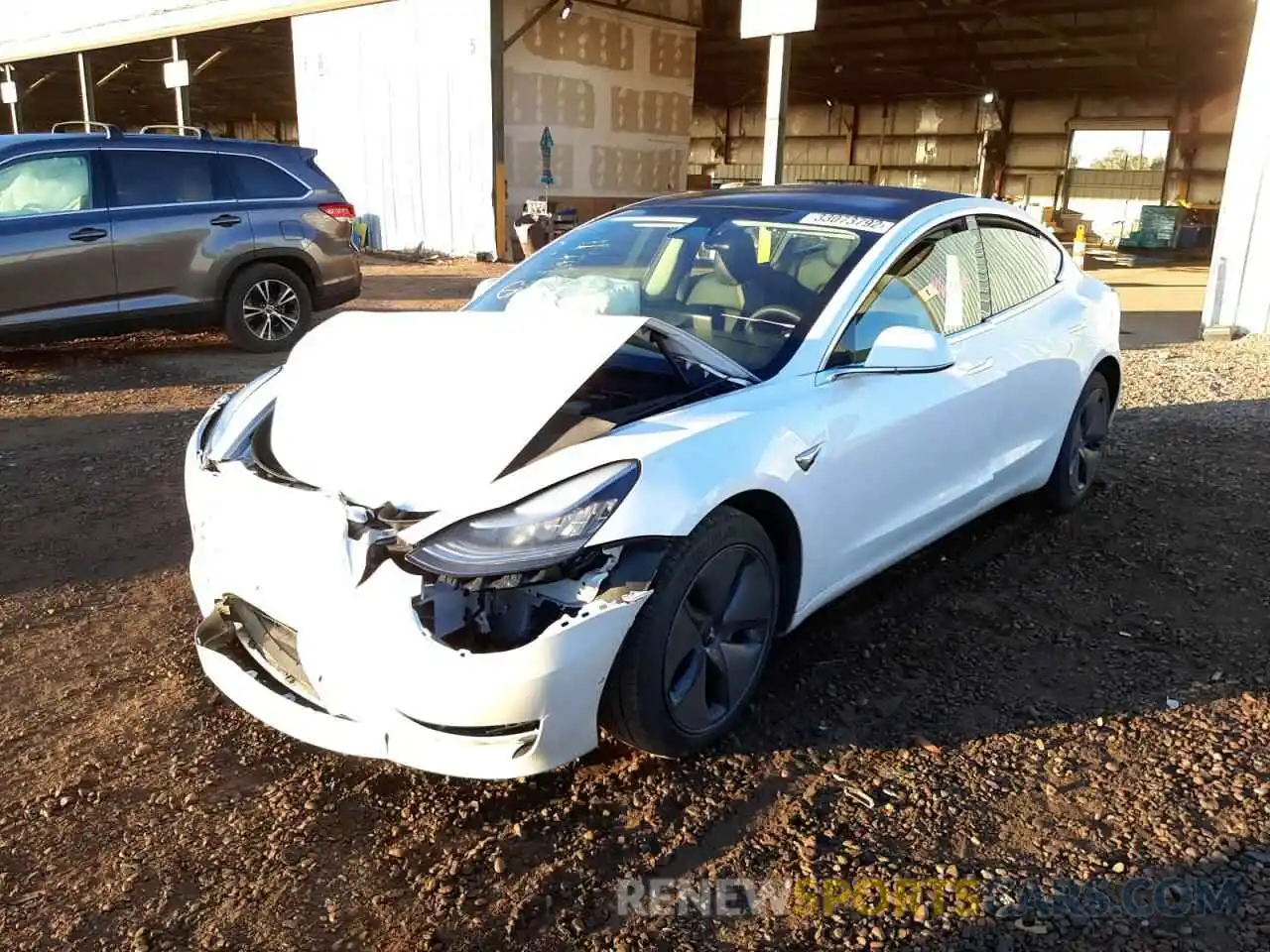 2 Photograph of a damaged car 5YJ3E1EB9LF636582 TESLA MODEL 3 2020