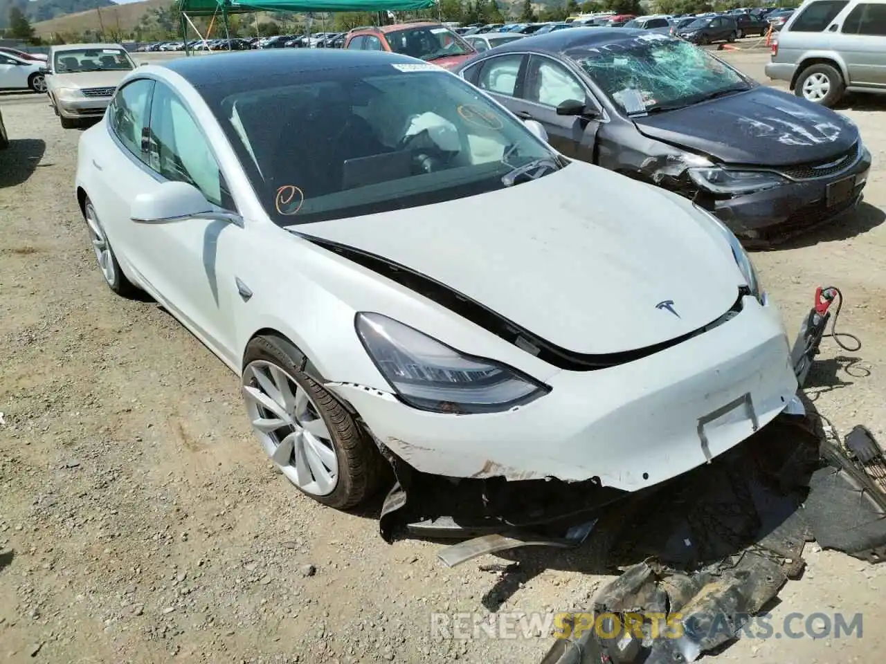 1 Photograph of a damaged car 5YJ3E1EB9LF638817 TESLA MODEL 3 2020