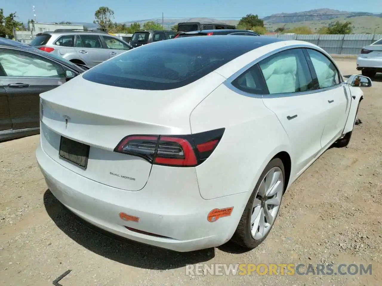 4 Photograph of a damaged car 5YJ3E1EB9LF638817 TESLA MODEL 3 2020