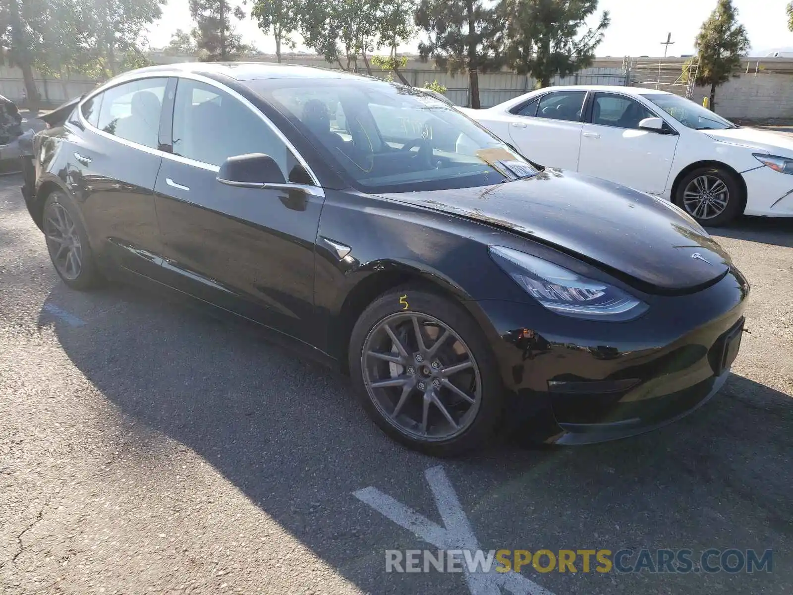 1 Photograph of a damaged car 5YJ3E1EB9LF647422 TESLA MODEL 3 2020