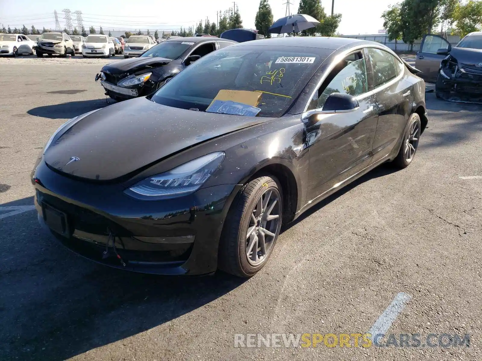 2 Photograph of a damaged car 5YJ3E1EB9LF647422 TESLA MODEL 3 2020