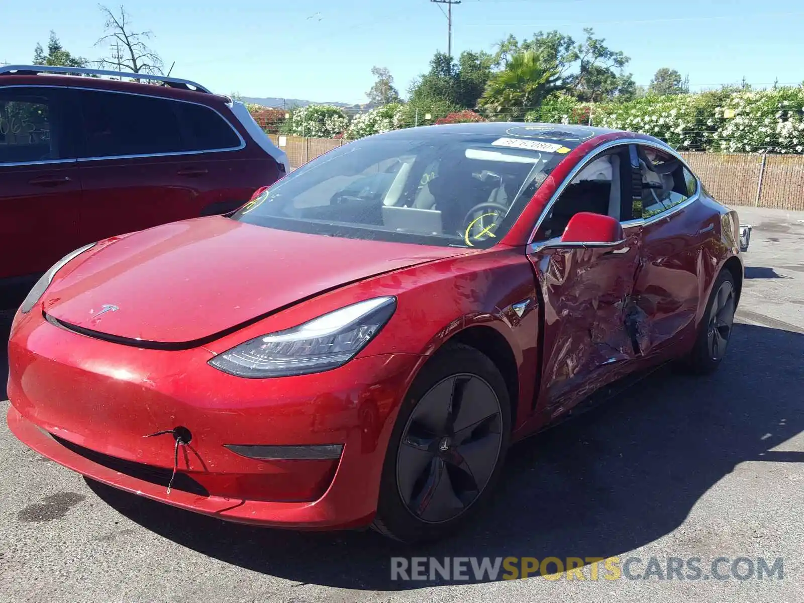 2 Photograph of a damaged car 5YJ3E1EB9LF664186 TESLA MODEL 3 2020