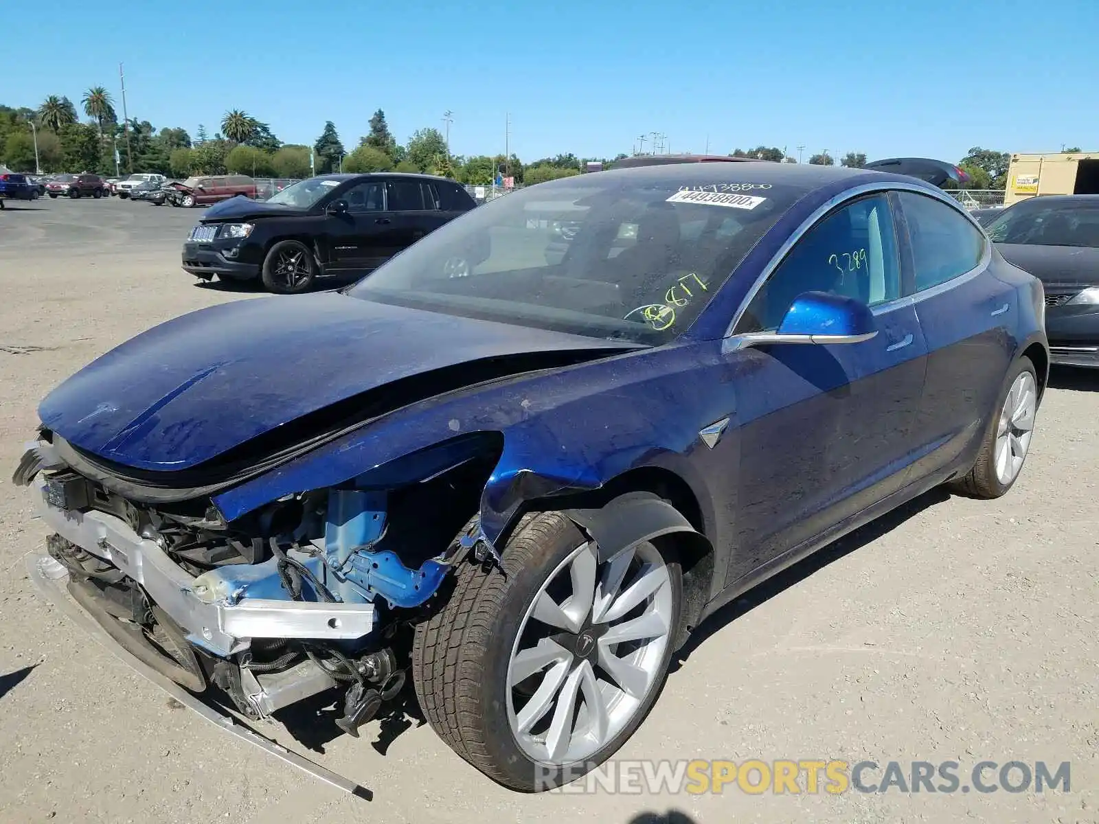 2 Photograph of a damaged car 5YJ3E1EB9LF667217 TESLA MODEL 3 2020