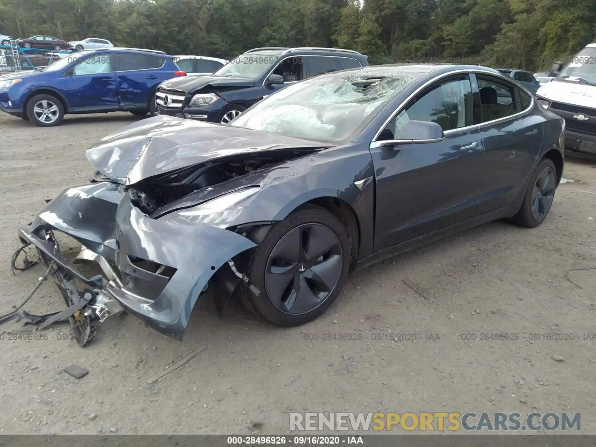 2 Photograph of a damaged car 5YJ3E1EB9LF710924 TESLA MODEL 3 2020