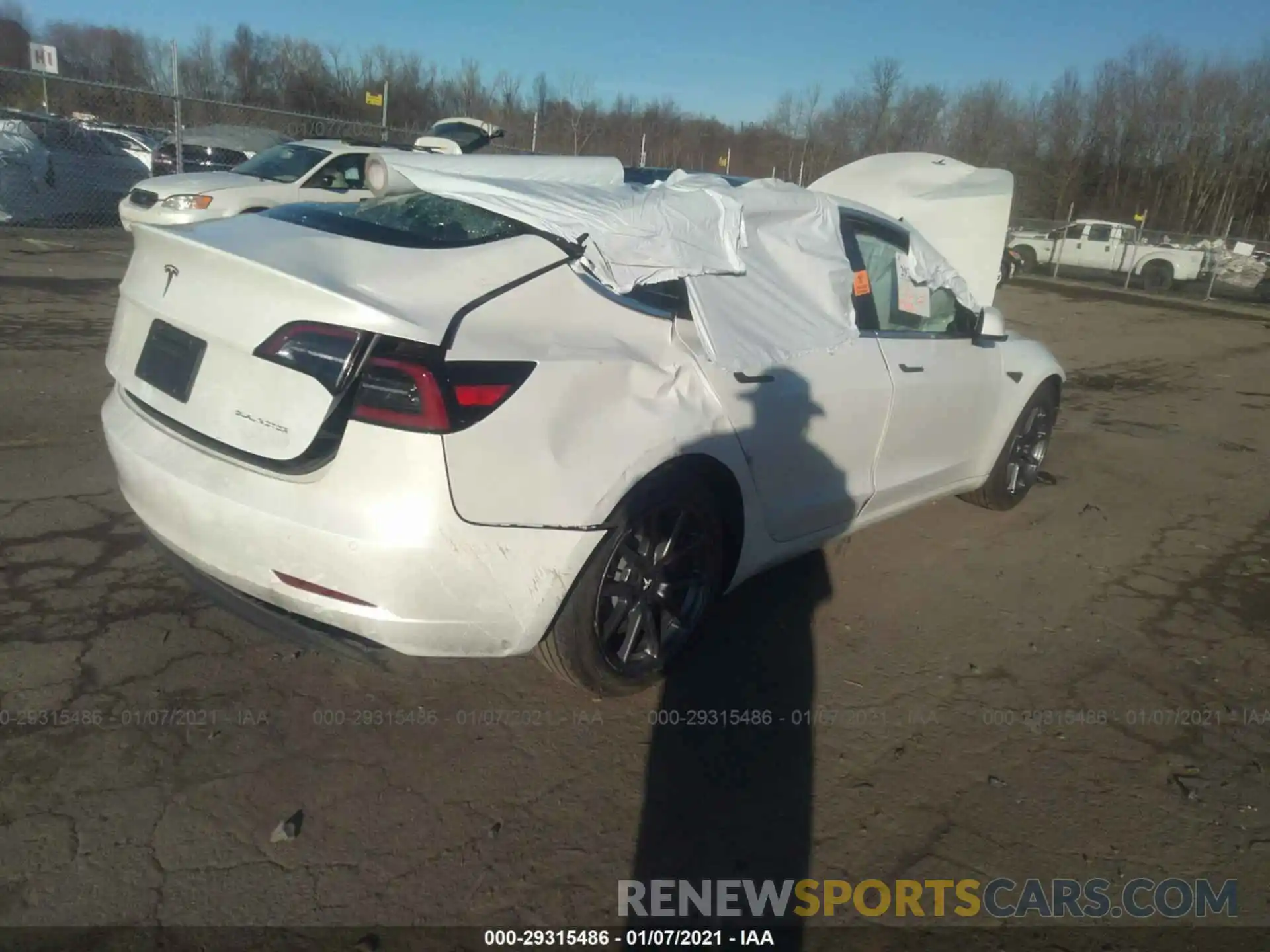 4 Photograph of a damaged car 5YJ3E1EB9LF720269 TESLA MODEL 3 2020