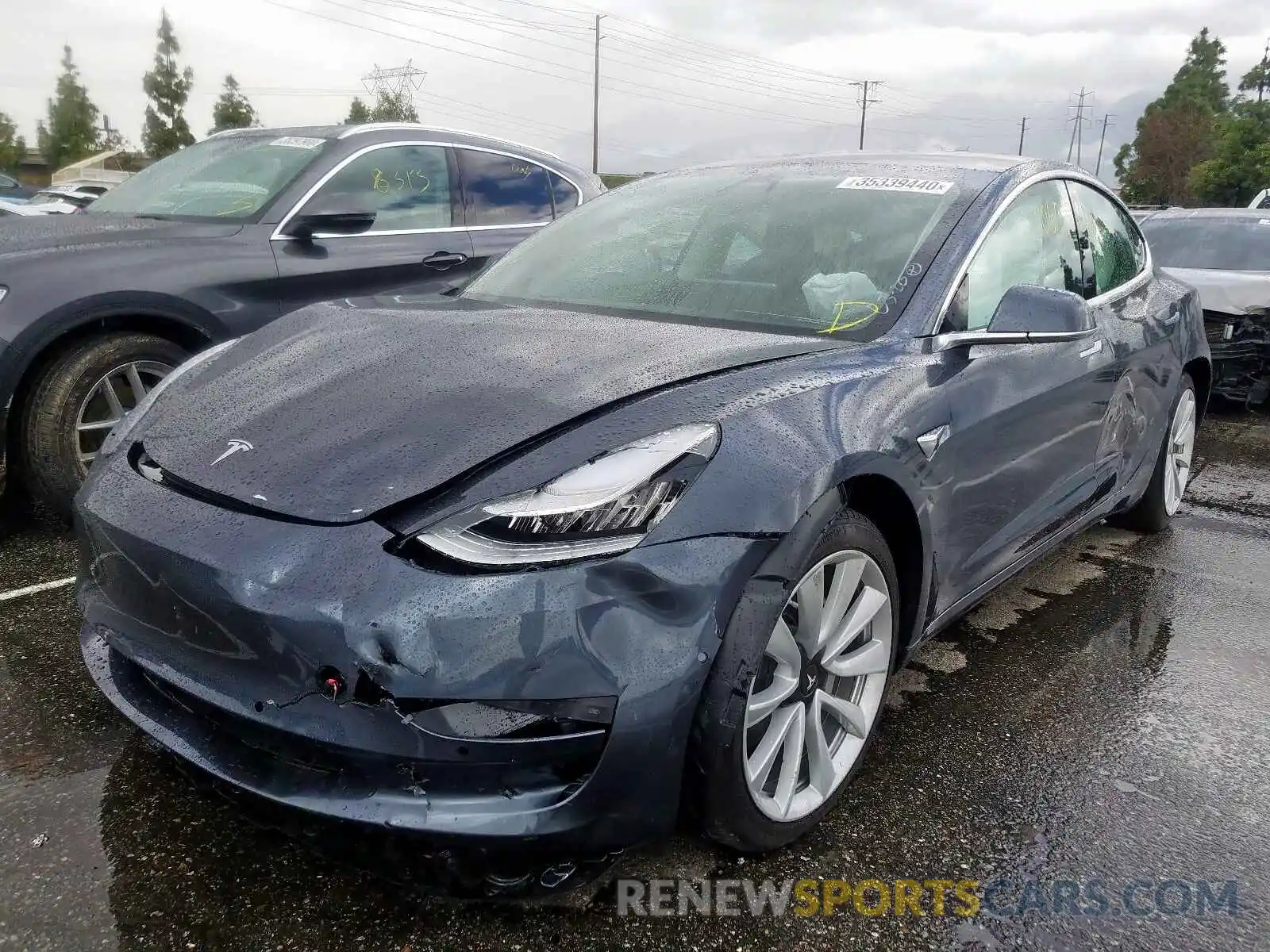 2 Photograph of a damaged car 5YJ3E1EBXLF637949 TESLA MODEL 3 2020