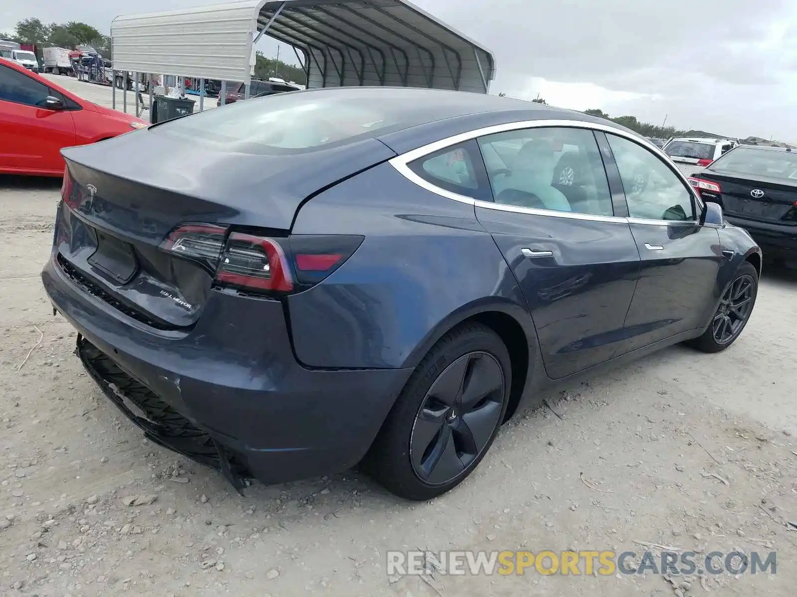 4 Photograph of a damaged car 5YJ3E1EBXLF667985 TESLA MODEL 3 2020