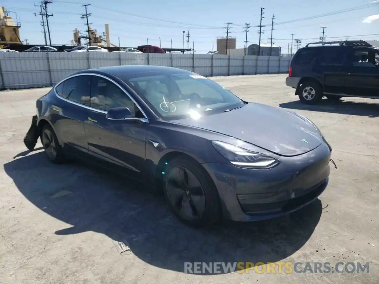 1 Photograph of a damaged car 5YJ3E1EBXLF667999 TESLA MODEL 3 2020