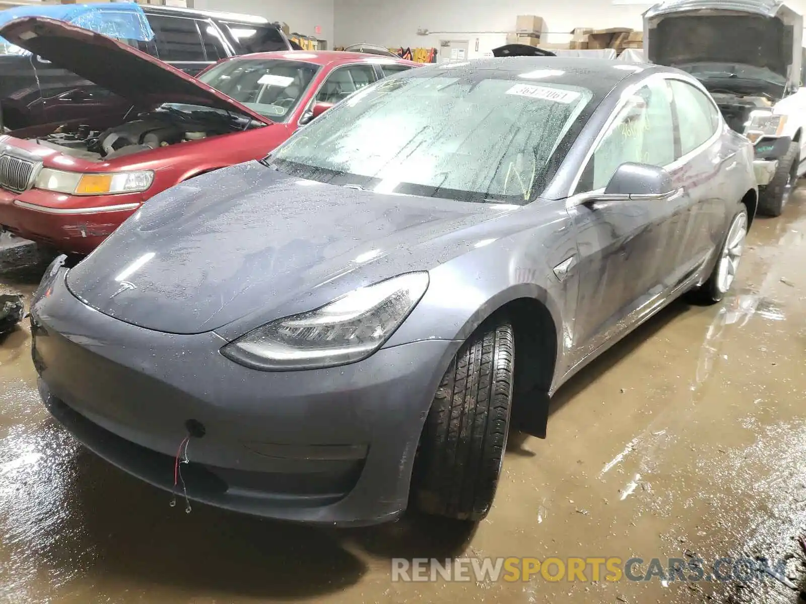 2 Photograph of a damaged car 5YJ3E1EBXLF769772 TESLA MODEL 3 2020