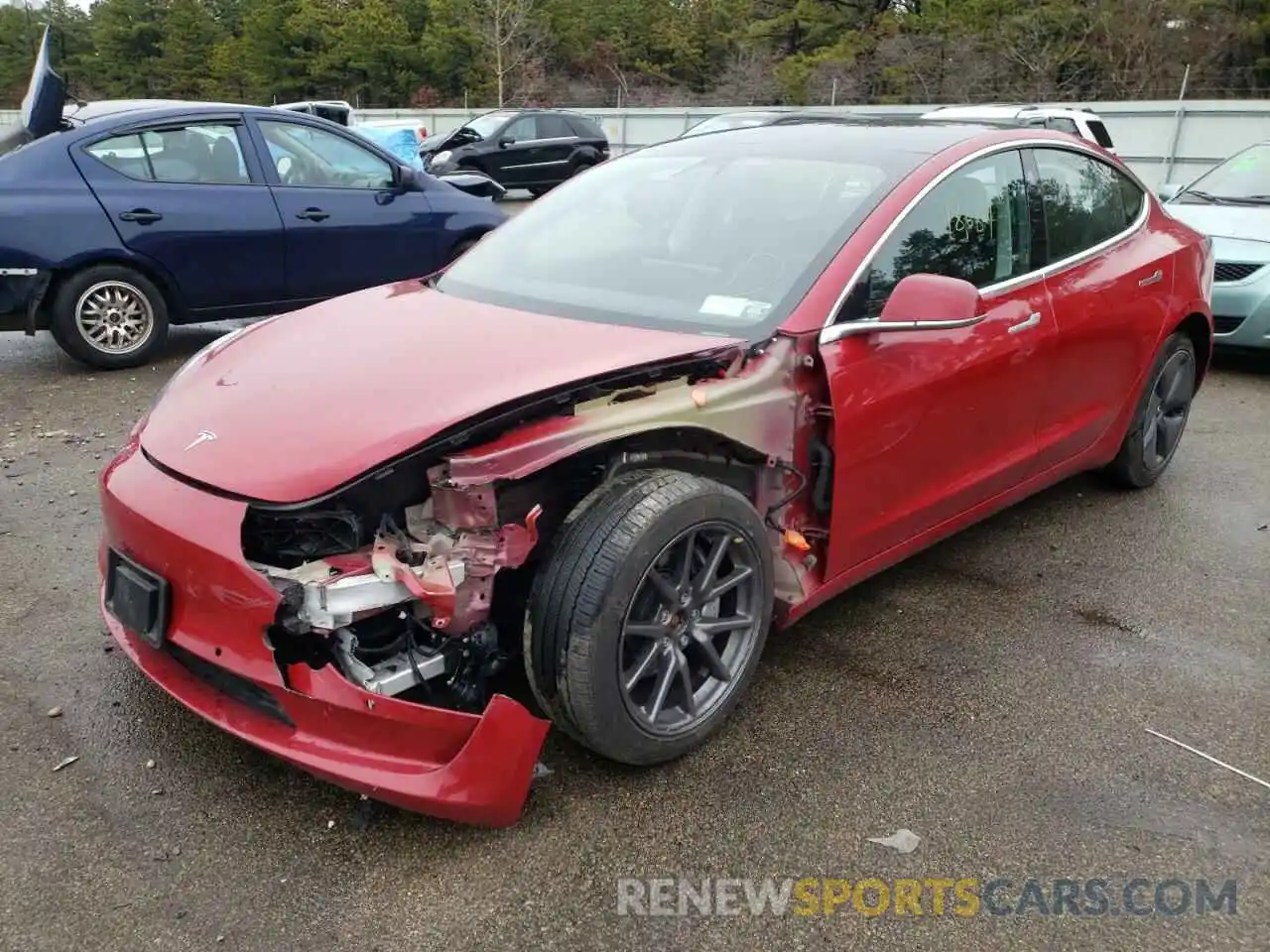 2 Photograph of a damaged car 5YJ3E1EC0LF586406 TESLA MODEL 3 2020