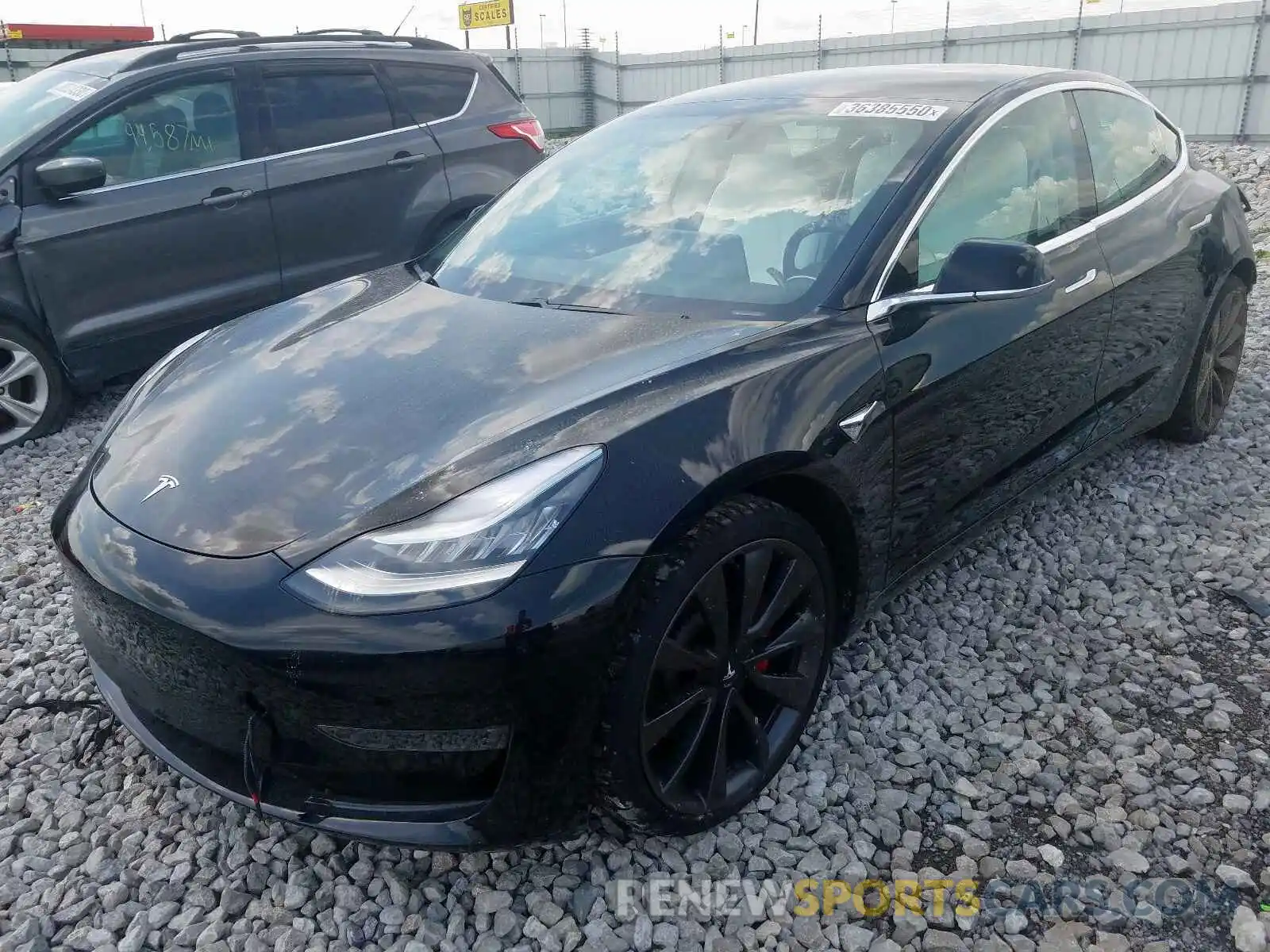 2 Photograph of a damaged car 5YJ3E1EC0LF603351 TESLA MODEL 3 2020