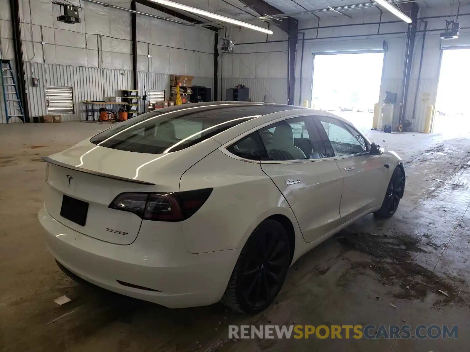 4 Photograph of a damaged car 5YJ3E1EC0LF624636 TESLA MODEL 3 2020