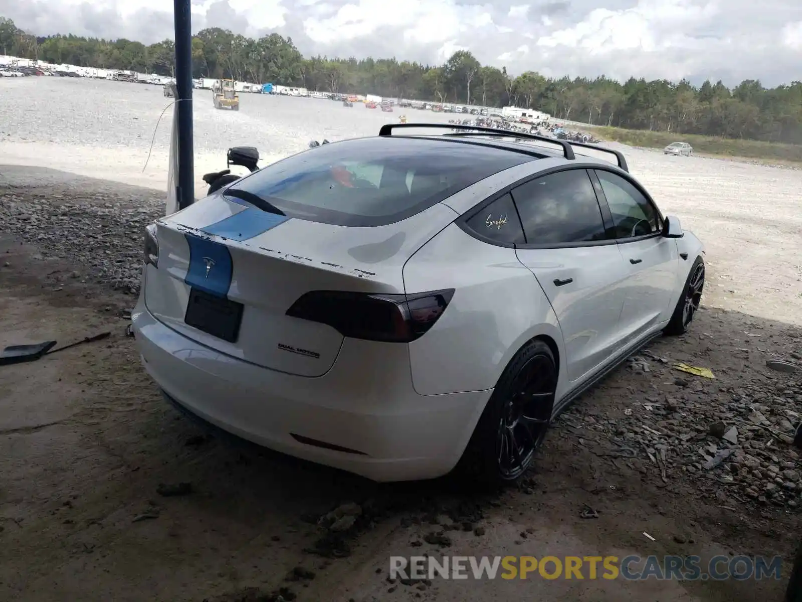 4 Photograph of a damaged car 5YJ3E1EC0LF627312 TESLA MODEL 3 2020