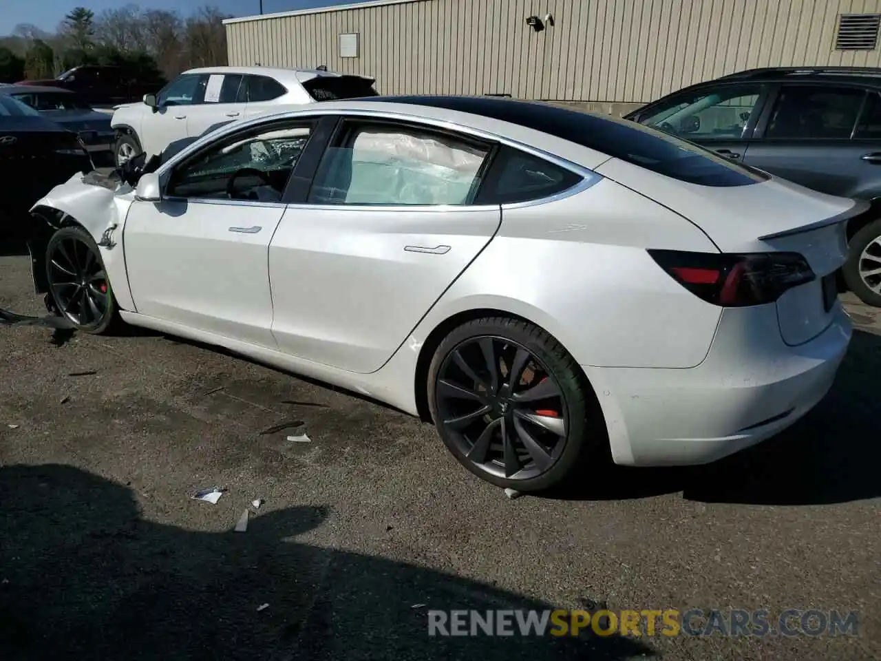 2 Photograph of a damaged car 5YJ3E1EC0LF714322 TESLA MODEL 3 2020