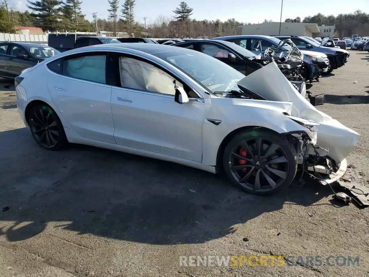 4 Photograph of a damaged car 5YJ3E1EC0LF714322 TESLA MODEL 3 2020