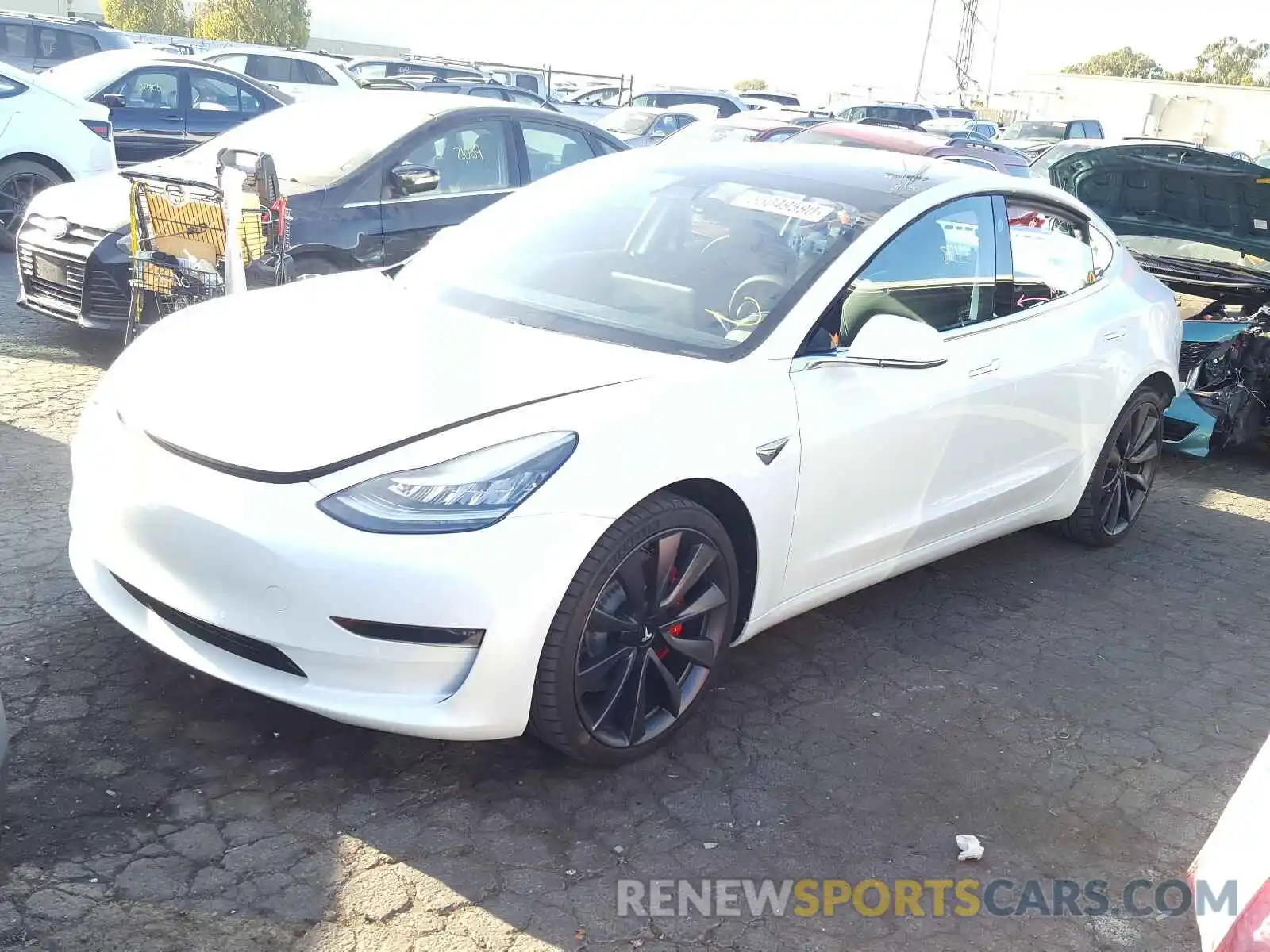 2 Photograph of a damaged car 5YJ3E1EC0LF719469 TESLA MODEL 3 2020