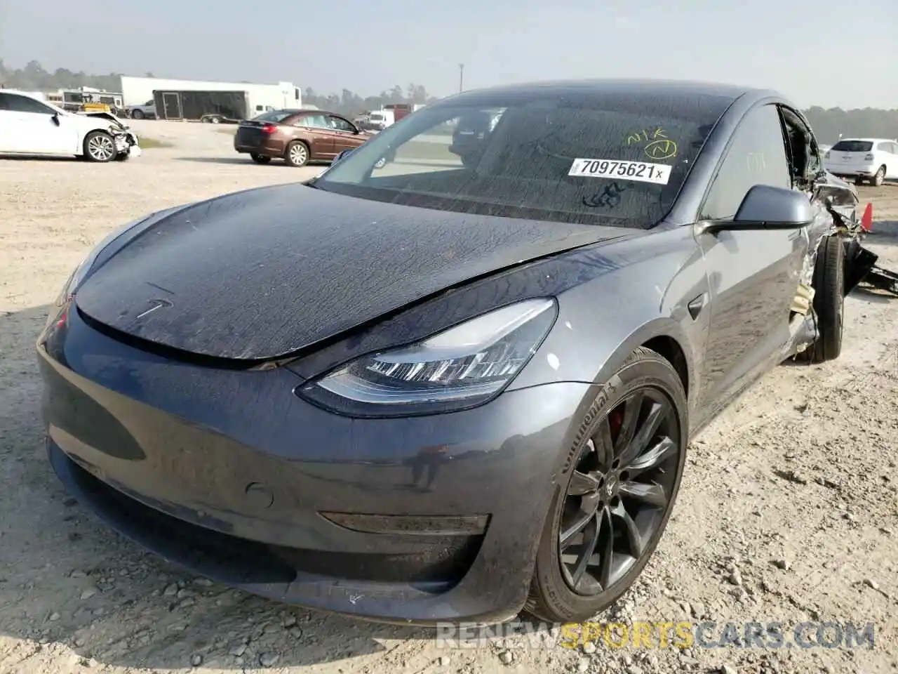 2 Photograph of a damaged car 5YJ3E1EC0LF721223 TESLA MODEL 3 2020